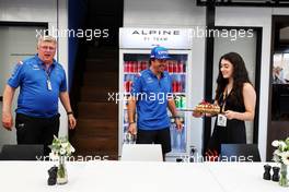 Fernando Alonso (ESP) Alpine F1 Team celebrates his birthday with Otmar Szafnauer (USA) Alpine F1 Team, Team Principal, his family, and a cake. 29.07.2022. Formula 1 World Championship, Rd 13, Hungarian Grand Prix, Budapest, Hungary, Practice Day.