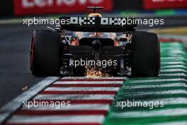 Daniel Ricciardo (AUS) McLaren MCL36 sends sparks flying. 29.07.2022. Formula 1 World Championship, Rd 13, Hungarian Grand Prix, Budapest, Hungary, Practice Day.