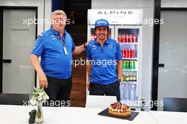 Fernando Alonso (ESP) Alpine F1 Team celebrates his birthday with Otmar Szafnauer (USA) Alpine F1 Team, Team Principal, and a cake. 29.07.2022. Formula 1 World Championship, Rd 13, Hungarian Grand Prix, Budapest, Hungary, Practice Day.
