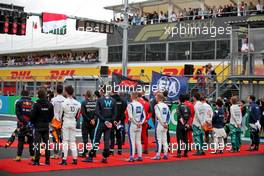 Drivers as the grid observes the national anthem. 31.07.2022. Formula 1 World Championship, Rd 13, Hungarian Grand Prix, Budapest, Hungary, Race Day.