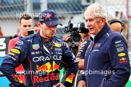 (L to R): Max Verstappen (NLD) Red Bull Racing with Dr Helmut Marko (AUT) Red Bull Motorsport Consultant on the grid. 31.07.2022. Formula 1 World Championship, Rd 13, Hungarian Grand Prix, Budapest, Hungary, Race Day.