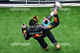 Race winner Max Verstappen (NLD) Red Bull Racing celebrates on the podium. 31.07.2022. Formula 1 World Championship, Rd 13, Hungarian Grand Prix, Budapest, Hungary, Race Day.