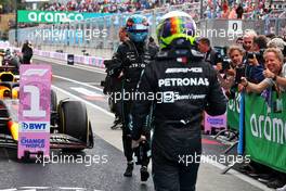 George Russell (GBR) Mercedes AMG F1 celebrates his third position with second placed team mate Lewis Hamilton (GBR) Mercedes AMG F1 in parc ferme. 31.07.2022. Formula 1 World Championship, Rd 13, Hungarian Grand Prix, Budapest, Hungary, Race Day.