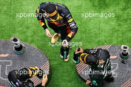 Race winner Max Verstappen (NLD) Red Bull Racing celebrates with second placed Lewis Hamilton (GBR) Mercedes AMG F1  and third placed George Russell (GBR) Mercedes AMG F1 on the podium. 31.07.2022. Formula 1 World Championship, Rd 13, Hungarian Grand Prix, Budapest, Hungary, Race Day.