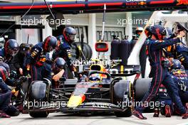 Sergio Perez (MEX) Red Bull Racing RB18 makes a pit stop. 31.07.2022. Formula 1 World Championship, Rd 13, Hungarian Grand Prix, Budapest, Hungary, Race Day.