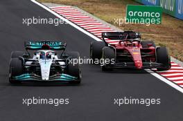 George Russell (GBR), Mercedes AMG F1 and Charles Leclerc (FRA), Scuderia Ferrari  31.07.2022. Formula 1 World Championship, Rd 13, Hungarian Grand Prix, Budapest, Hungary, Race Day.