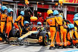 Lando Norris (GBR) McLaren MCL36 makes a pit stop. 31.07.2022. Formula 1 World Championship, Rd 13, Hungarian Grand Prix, Budapest, Hungary, Race Day.