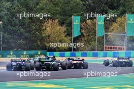 Nicholas Latifi (CDN) Williams Racing FW44 and Sebastian Vettel (GER) Aston Martin F1 Team AMR22 at the start of the race - debris. 31.07.2022. Formula 1 World Championship, Rd 13, Hungarian Grand Prix, Budapest, Hungary, Race Day.