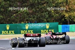 George Russell (GBR) Mercedes AMG F1 W13 and Charles Leclerc (MON) Ferrari F1-75 battle for position. 31.07.2022. Formula 1 World Championship, Rd 13, Hungarian Grand Prix, Budapest, Hungary, Race Day.
