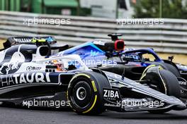 Yuki Tsunoda (JPN) AlphaTauri AT03 and Alexander Albon (THA) Williams Racing FW44. 31.07.2022. Formula 1 World Championship, Rd 13, Hungarian Grand Prix, Budapest, Hungary, Race Day.