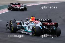 George Russell (GBR), Mercedes AMG F1 and Max Verstappen (NLD), Red Bull Racing  31.07.2022. Formula 1 World Championship, Rd 13, Hungarian Grand Prix, Budapest, Hungary, Race Day.
