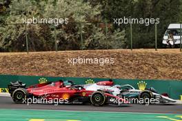 Charles Leclerc (MON) Ferrari F1-75 and George Russell (GBR) Mercedes AMG F1 W13 battle for the lead of the race. 31.07.2022. Formula 1 World Championship, Rd 13, Hungarian Grand Prix, Budapest, Hungary, Race Day.