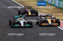 Lewis Hamilton (GBR), Mercedes AMG F1  and Lando Norris (GBR), McLaren F1 Team  31.07.2022. Formula 1 World Championship, Rd 13, Hungarian Grand Prix, Budapest, Hungary, Race Day.