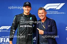 (L to R): Pole sitter George Russell (GBR) Mercedes AMG F1 celebrates in qualifying parc ferme with Tom Kristensen (DEN). 30.07.2022. Formula 1 World Championship, Rd 13, Hungarian Grand Prix, Budapest, Hungary, Qualifying Day.