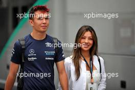 Alexander Albon (THA) Williams Racing with his girlfriend Muni Lily He (CHN) Professional Golfer. 30.07.2022. Formula 1 World Championship, Rd 13, Hungarian Grand Prix, Budapest, Hungary, Qualifying Day.