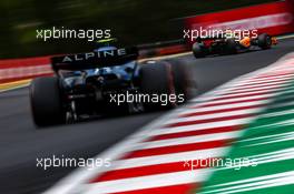 Lando Norris (GBR), McLaren F1 Team and Esteban Ocon (FRA), Alpine F1 Team  30.07.2022. Formula 1 World Championship, Rd 13, Hungarian Grand Prix, Budapest, Hungary, Qualifying Day.