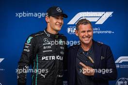 (L to R): George Russell (GBR) Mercedes AMG F1 celebrates his pole position in qualifying parc ferme with Tom Kristensen (DEN). 30.07.2022. Formula 1 World Championship, Rd 13, Hungarian Grand Prix, Budapest, Hungary, Qualifying Day.