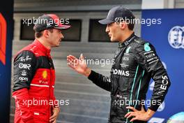 (L to R): Charles Leclerc (MON) Ferrari with pole sitter George Russell (GBR) Mercedes AMG F1 in qualifying parc ferme. 30.07.2022. Formula 1 World Championship, Rd 13, Hungarian Grand Prix, Budapest, Hungary, Qualifying Day.