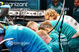Sebastian Vettel (GER) Aston Martin F1 Team helps with the repairs of his Aston Martin F1 Team AMR22. 30.07.2022. Formula 1 World Championship, Rd 13, Hungarian Grand Prix, Budapest, Hungary, Qualifying Day.