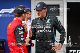 (L to R): Charles Leclerc (MON) Ferrari in qualifying parc ferme with pole sitter George Russell (GBR) Mercedes AMG F1. 30.07.2022. Formula 1 World Championship, Rd 13, Hungarian Grand Prix, Budapest, Hungary, Qualifying Day.
