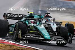 Sebastian Vettel (GER) Aston Martin F1 Team AMR22 and George Russell (GBR) Mercedes AMG F1 W13. 30.07.2022. Formula 1 World Championship, Rd 13, Hungarian Grand Prix, Budapest, Hungary, Qualifying Day.