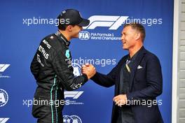 (L to R): George Russell (GBR) Mercedes AMG F1 celebrates his pole position in qualifying parc ferme with Tom Kristensen (DEN). 30.07.2022. Formula 1 World Championship, Rd 13, Hungarian Grand Prix, Budapest, Hungary, Qualifying Day.
