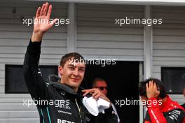 George Russell (GBR) Mercedes AMG F1 celebrates his pole position in qualifying parc ferme. 30.07.2022. Formula 1 World Championship, Rd 13, Hungarian Grand Prix, Budapest, Hungary, Qualifying Day.