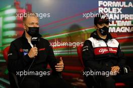 (L to R): Kevin Magnussen (DEN) Haas F1 Team and Guanyu Zhou (CHN) Alfa Romeo F1 Team in the FIA Press Conference. 22.04.2022. Formula 1 World Championship, Rd 4, Emilia Romagna Grand Prix, Imola, Italy, Qualifying Day.