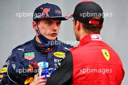 (L to R): Max Verstappen (NLD) Red Bull Racing with Charles Leclerc (MON) Ferrari in qualifying parc ferme. 22.04.2022. Formula 1 World Championship, Rd 4, Emilia Romagna Grand Prix, Imola, Italy, Qualifying Day.