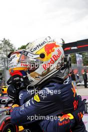 Race winner Max Verstappen (NLD) Red Bull Racing celebrates in parc ferme with second placed team mate Sergio Perez (MEX) Red Bull Racing.. 24.04.2022. Formula 1 World Championship, Rd 4, Emilia Romagna Grand Prix, Imola, Italy, Race Day.