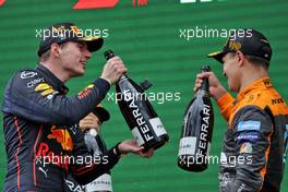 (L to R): Race winner Max Verstappen (NLD) Red Bull Racing celebrates on the podium with third placed Lando Norris (GBR) McLaren. 24.04.2022. Formula 1 World Championship, Rd 4, Emilia Romagna Grand Prix, Imola, Italy, Race Day.