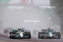 Lewis Hamilton (GBR) Mercedes AMG F1 W13 and Lance Stroll (CDN) Aston Martin F1 Team AMR22 battle for position. 24.04.2022. Formula 1 World Championship, Rd 4, Emilia Romagna Grand Prix, Imola, Italy, Race Day.