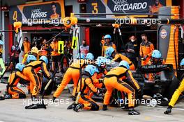 Lando Norris (GBR) McLaren MCL36 makes a pit stop. 24.04.2022. Formula 1 World Championship, Rd 4, Emilia Romagna Grand Prix, Imola, Italy, Race Day.