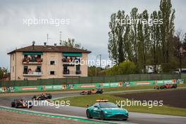 Max Verstappen (NLD) Red Bull Racing RB18 leads behind the Aston Martin FIA Safety Car. 24.04.2022. Formula 1 World Championship, Rd 4, Emilia Romagna Grand Prix, Imola, Italy, Race Day.