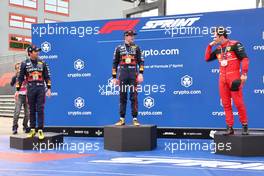 Sergio Perez (MEX) Red Bull Racing with Max Verstappen (NLD) Red Bull Racing and Charles Leclerc (MON) Ferrari. 23.04.2022. Formula 1 World Championship, Rd 4, Emilia Romagna Grand Prix, Imola, Italy, Sprint Day.