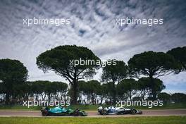 Yuki Tsunoda (JPN) AlphaTauri AT03 leads Sebastian Vettel (GER) Aston Martin F1 Team AMR22. 23.04.2022. Formula 1 World Championship, Rd 4, Emilia Romagna Grand Prix, Imola, Italy, Sprint Day.