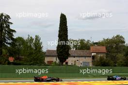 Esteban Ocon (FRA) Alpine F1 Team A522 leads Sergio Perez (MEX) Red Bull Racing RB18. 23.04.2022. Formula 1 World Championship, Rd 4, Emilia Romagna Grand Prix, Imola, Italy, Sprint Day.