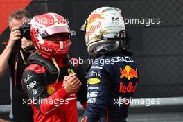 Charles Leclerc (MON) Ferrari F1-75 and Max Verstappen (NLD) Red Bull Racing. 23.04.2022. Formula 1 World Championship, Rd 4, Emilia Romagna Grand Prix, Imola, Italy, Sprint Day.