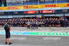 (L to R): Sergio Perez (MEX) Red Bull Racing; Christian Horner (GBR) Red Bull Racing Team Principal; and Max Verstappen (NLD) Red Bull Racing, in the pits as a minute's silence is held in memory of Queen Elizabeth II. 09.09.2022. Formula 1 World Championship, Rd 16, Italian Grand Prix, Monza, Italy, Practice Day.