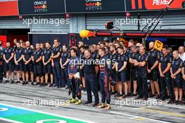 (L to R): Sergio Perez (MEX) Red Bull Racing; Christian Horner (GBR) Red Bull Racing Team Principal; and Max Verstappen (NLD) Red Bull Racing, in the pits as a minute's silence is held in memory of Queen Elizabeth II. 09.09.2022. Formula 1 World Championship, Rd 16, Italian Grand Prix, Monza, Italy, Practice Day.