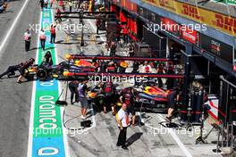 Sergio Perez (MEX) Red Bull Racing RB18 and Max Verstappen (NLD) Red Bull Racing RB18 in the pits. 09.09.2022. Formula 1 World Championship, Rd 16, Italian Grand Prix, Monza, Italy, Practice Day.