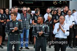 (L to R): George Russell (GBR) Mercedes AMG F1; Lewis Hamilton (GBR) Mercedes AMG F1; and Stefano Domenicali (ITA) Formula One President and CEO, in the pits as a minute's silence is held in memory of Queen Elizabeth II. 09.09.2022. Formula 1 World Championship, Rd 16, Italian Grand Prix, Monza, Italy, Practice Day.