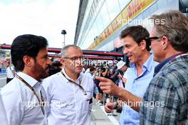 (L to R): Mohammed Bin Sulayem (UAE) FIA President with Stefano Domenicali (ITA) Formula One President and CEO and Toto Wolff (GER) Mercedes AMG F1 Shareholder and Executive Director. 09.09.2022. Formula 1 World Championship, Rd 16, Italian Grand Prix, Monza, Italy, Practice Day.