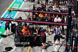 Sergio Perez (MEX) Red Bull Racing RB18 and Max Verstappen (NLD) Red Bull Racing RB18 in the pits. 09.09.2022. Formula 1 World Championship, Rd 16, Italian Grand Prix, Monza, Italy, Practice Day.