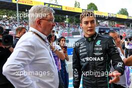 (L to R): Ross Brawn (GBR) Managing Director, Motor Sports with George Russell (GBR) Mercedes AMG F1. 09.09.2022. Formula 1 World Championship, Rd 16, Italian Grand Prix, Monza, Italy, Practice Day.