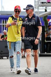 Max Verstappen (NLD) Red Bull Racing with a fan. 09.09.2022. Formula 1 World Championship, Rd 16, Italian Grand Prix, Monza, Italy, Practice Day.