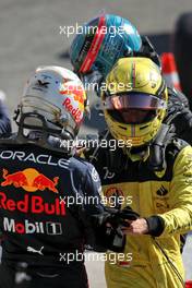 (L to R): Max Verstappen (NLD) Red Bull Racing in parc ferme with Charles Leclerc (MON) Ferrari and George Russell (GBR) Mercedes AMG F1. 11.09.2022. Formula 1 World Championship, Rd 16, Italian Grand Prix, Monza, Italy, Race Day.