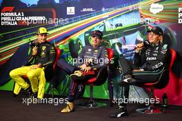 (L to R): Charles Leclerc (MON) Ferrari, Max Verstappen (NLD) Red Bull Racing; and George Russell (GBR) Mercedes AMG F1, in the post race FIA Press Conference. 11.09.2022. Formula 1 World Championship, Rd 16, Italian Grand Prix, Monza, Italy, Race Day.