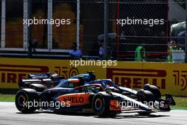 Lando Norris (GBR) McLaren MCL36 and Fernando Alonso (ESP) Alpine F1 Team A522 battle for position. 11.09.2022. Formula 1 World Championship, Rd 16, Italian Grand Prix, Monza, Italy, Race Day.