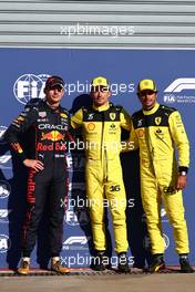 Pole sitter Charles Leclerc (MON) Ferrari celebrates in qualifying parc ferme with second placed Max Verstappen (NLD) Red Bull Racing and Carlos Sainz Jr (ESP) Ferrari in third. 10.09.2022. Formula 1 World Championship, Rd 16, Italian Grand Prix, Monza, Italy, Qualifying Day.